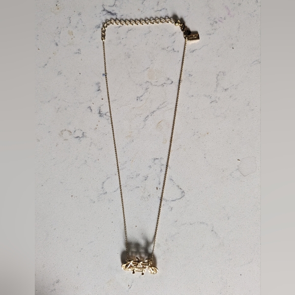 Kate Spade gold bicycle pendant necklace with adjustable 14"-18" chain - Picture 2 of 4